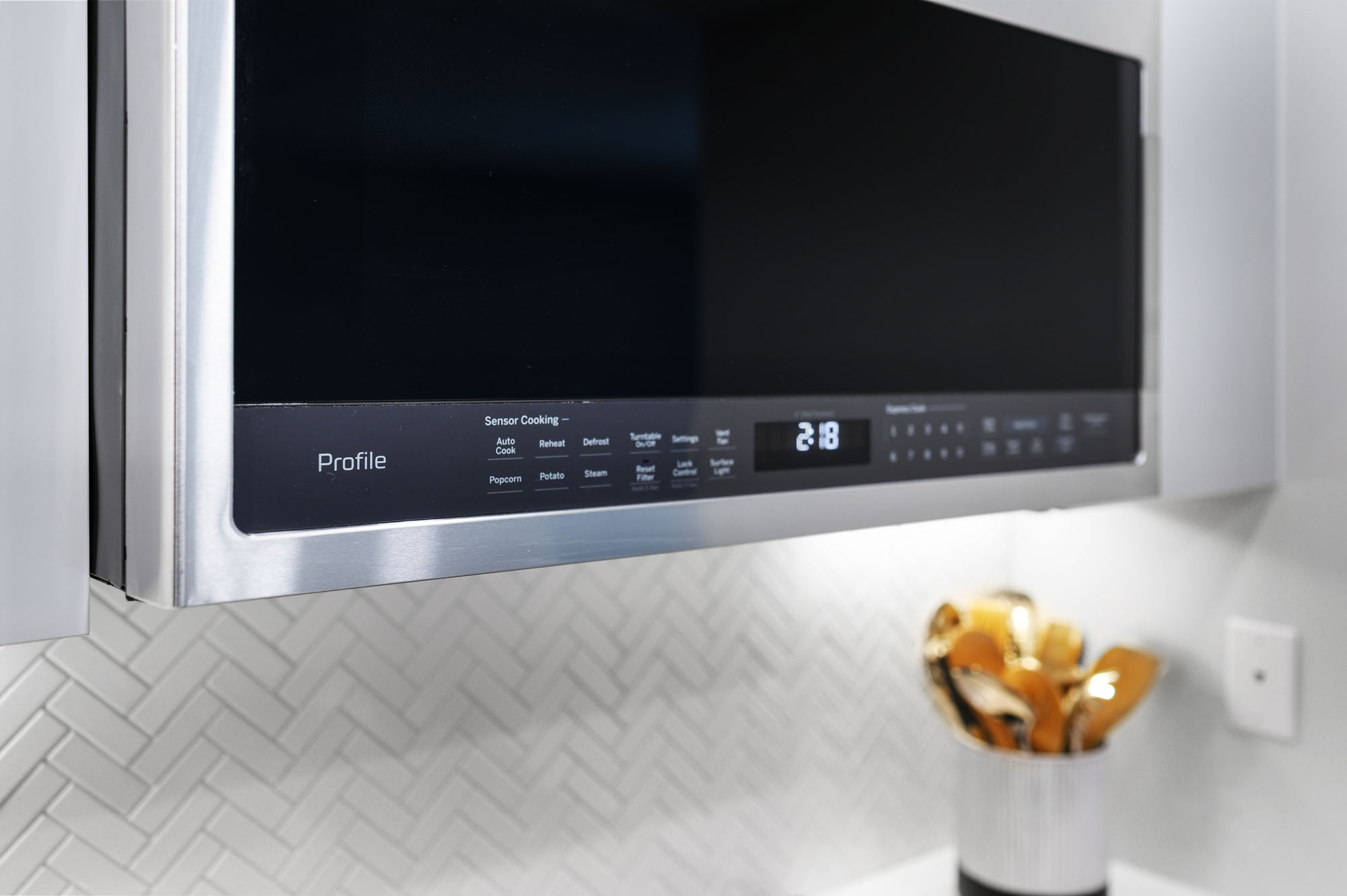 GE Profile external over-the-range microwave in stainless steel